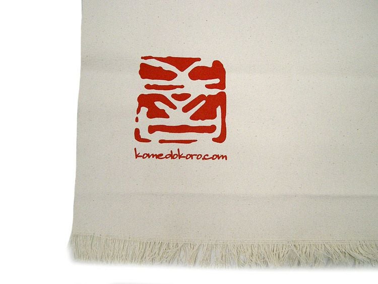 安藤米穀店のロゴマークをアップで撮影