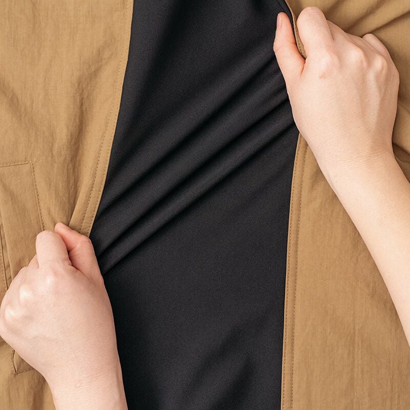 防風ニット<br>身頃脇と袖切替（後身頃）箇所に防風ニットを採用し動きやすさを追求