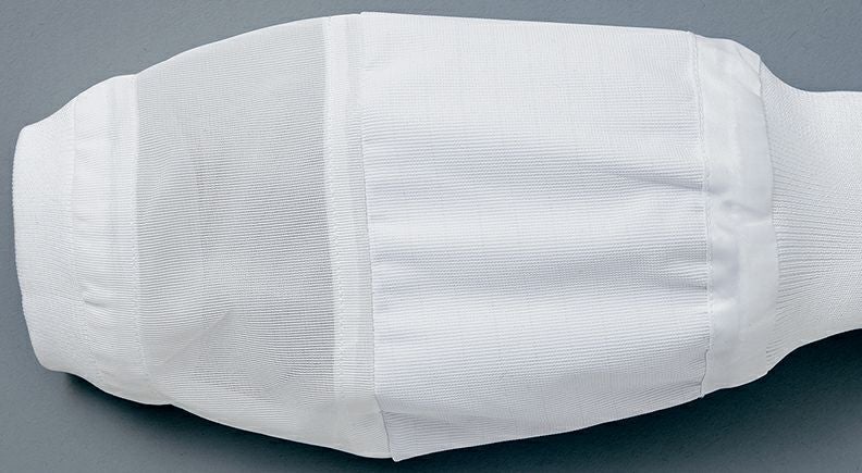 インナーガード<br>袖口、裾口のインナーに体毛落下防止にソフトにフィットするリブを使用。